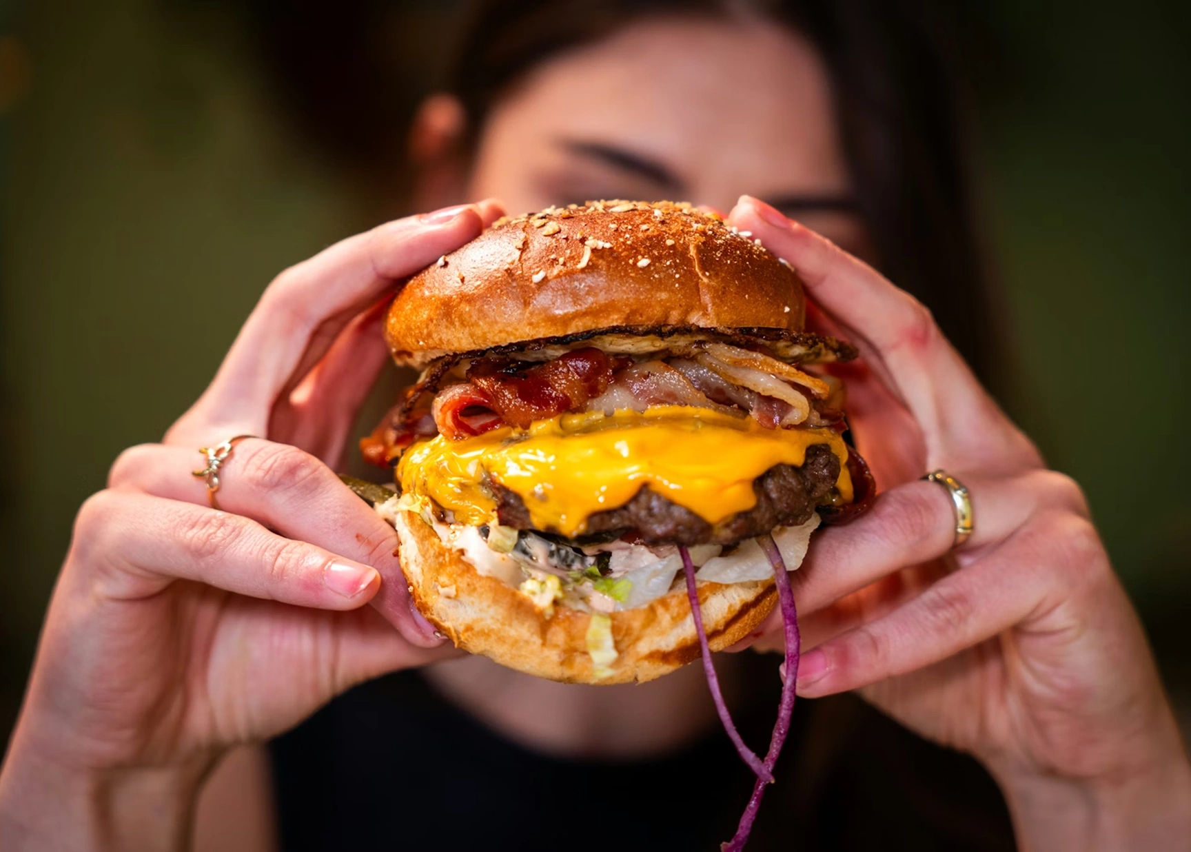 CHAR Signature Cheesy Burger with dripping cheese